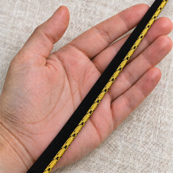 Black and Gold Tone Piping Trim with Braided Edge, 10 mm — In hand