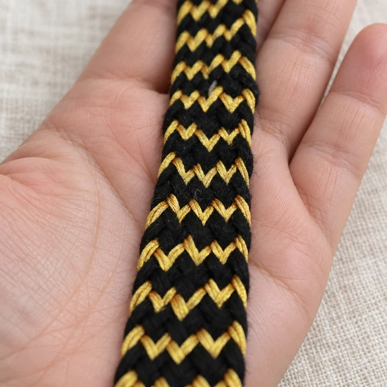 Black and Gold Wide Zigzag Braided Trim — In hand