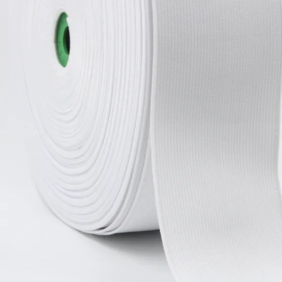 White Woven Elastic Tape on a Green Core