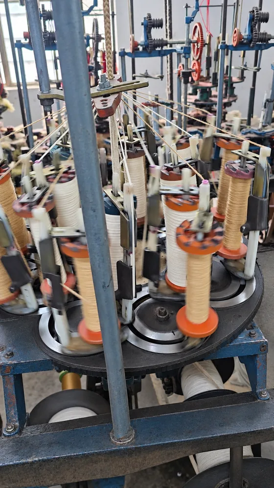 Natural-colour yarn carriers in our Jaipur factory