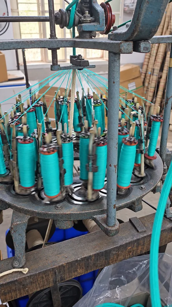 Turquoise cord braiding in our Jaipur factory