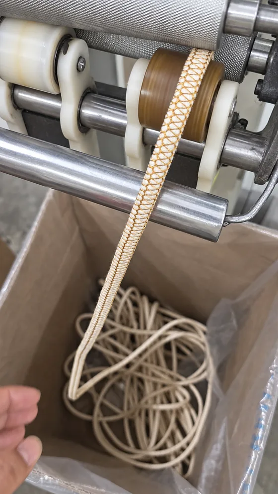 Cream patterned cord finishing in our Jaipur factory