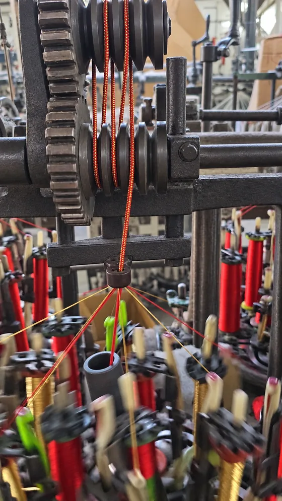Red cord braiding machine in our Jaipur factory