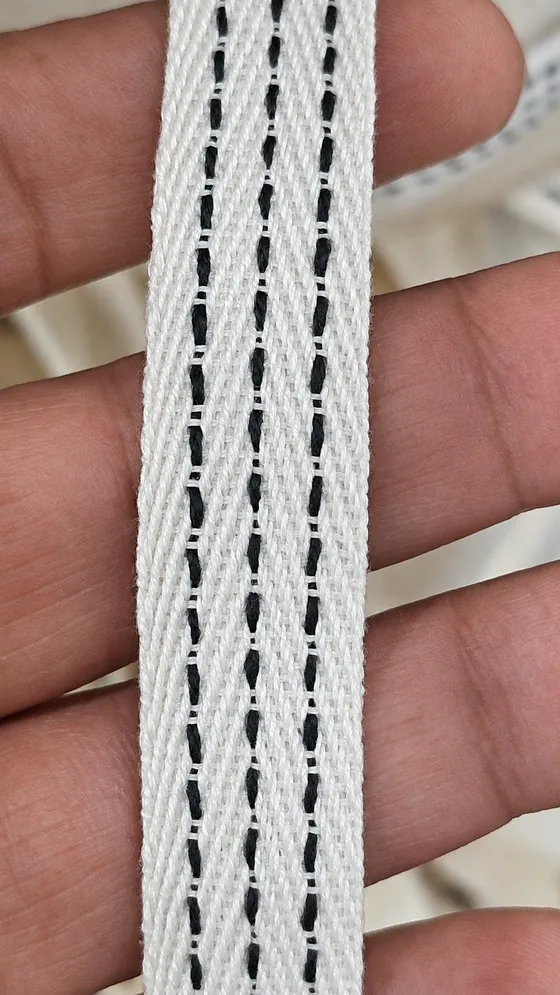 White tape with dark detailing in our Jaipur factory