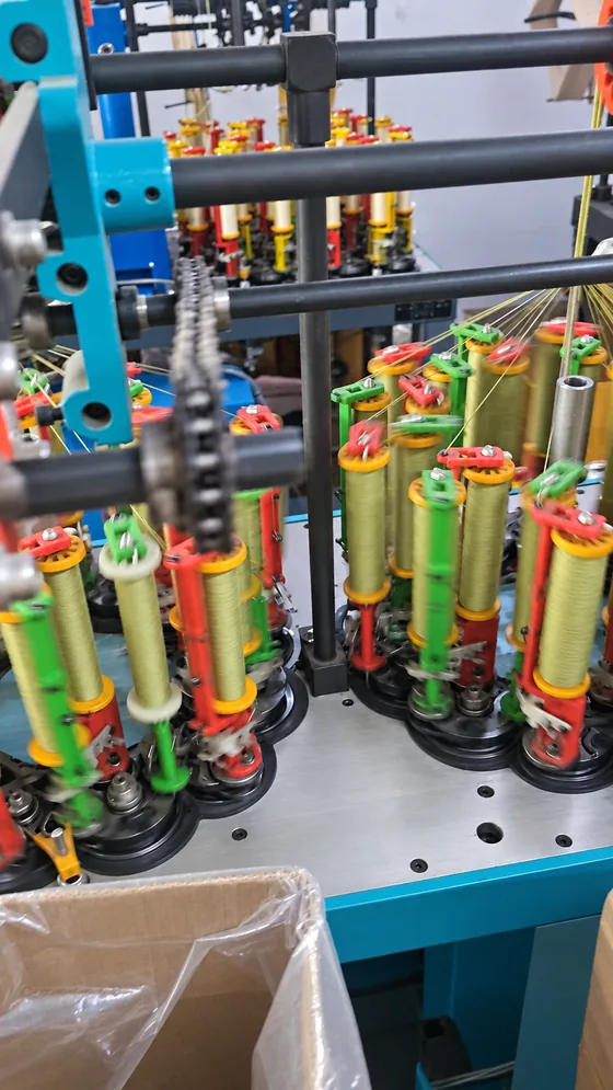 Green yarn carriers in our Jaipur factory