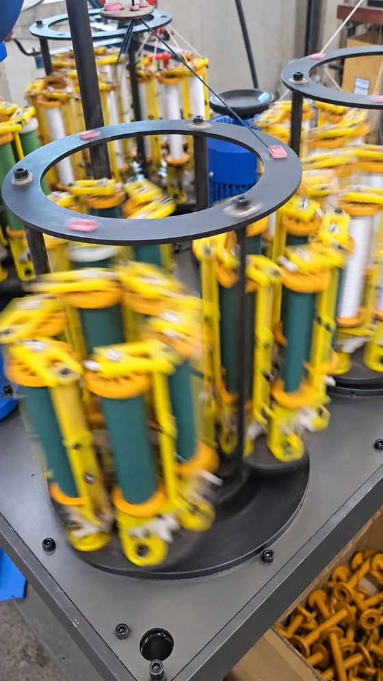 Fine-cord braiding carriers in our Jaipur factory