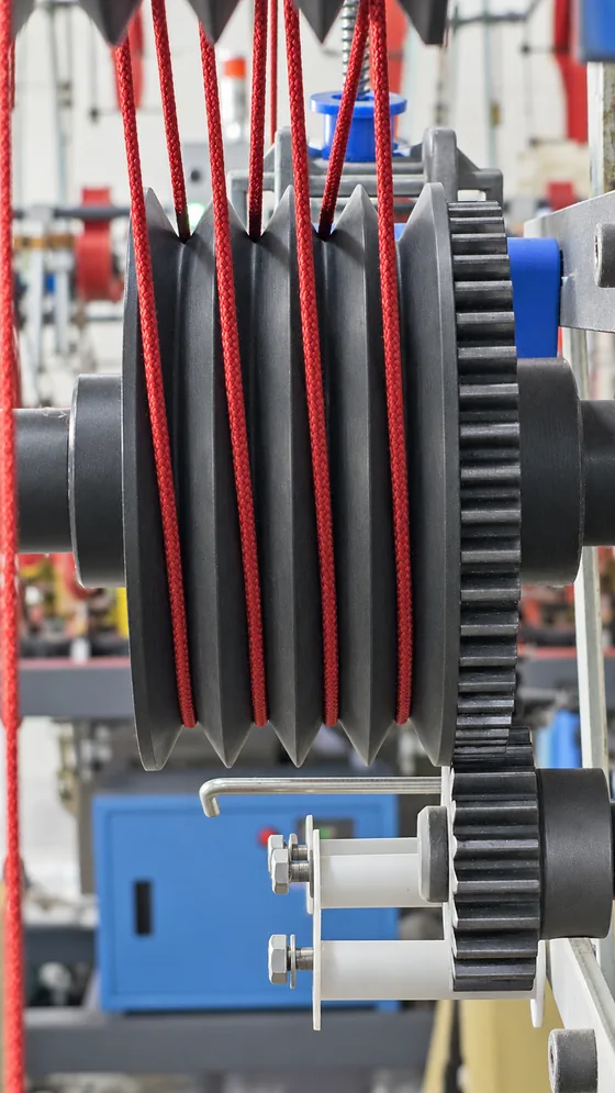 Red cord on the take-up wheel in our Jaipur factory