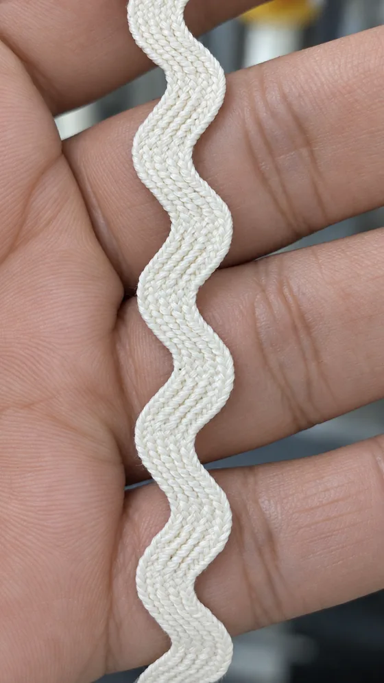 White ric-rac trim sample in our Jaipur factory