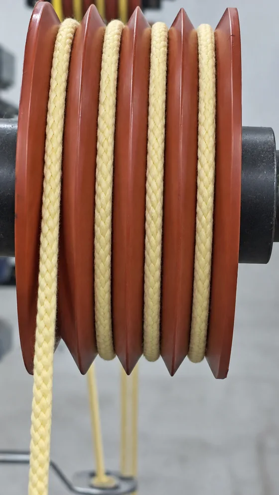 Yellow cord take-up wheel in our Jaipur factory