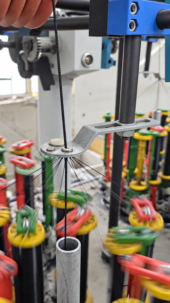 Black cord braiding in our Jaipur factory