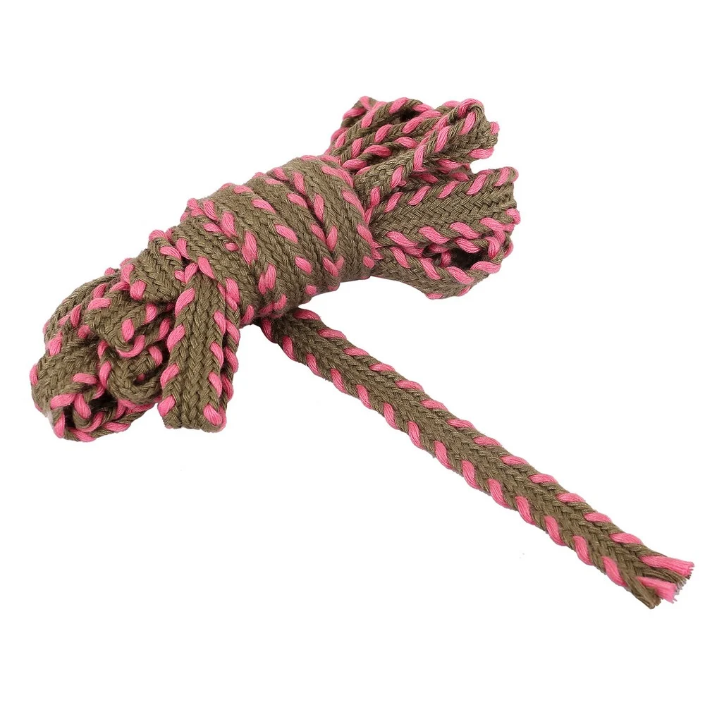 Brown and pink Khajuri Lace in a hank with a loose length showing its flat braided construction